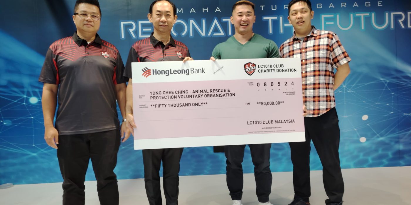 Cheque handover group photo